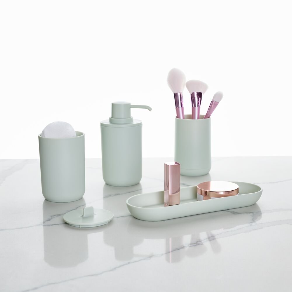 http://idesignlivesimply.com/cdn/shop/products/cade-bath-accessories-set-of-4-green-tint-95508n-pump-caddy-651167_1200x1200.jpg?v=1695831405