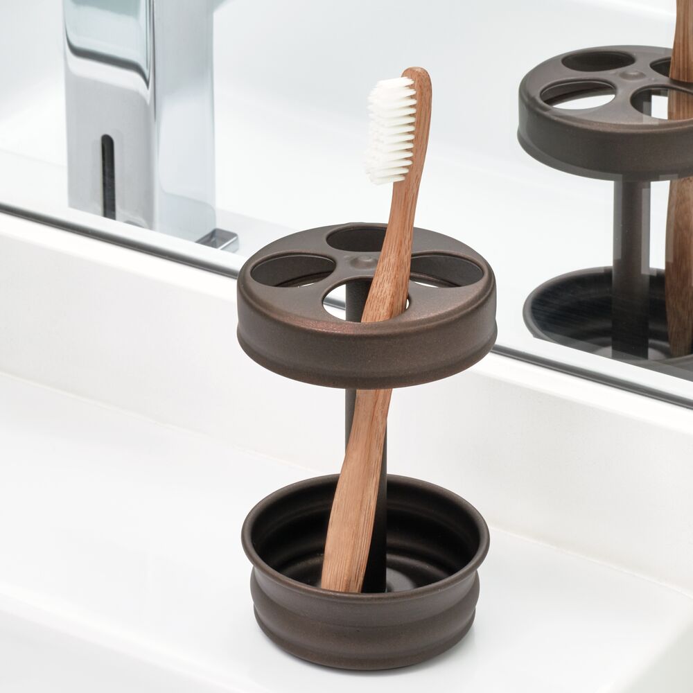 http://idesignlivesimply.com/cdn/shop/products/idesign-olivia-toothbrush-stand-in-bronze-26281-toothbrush-stand-102004_1200x1200.jpg?v=1695831686